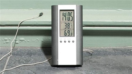 A digital thermometer measures 69.8 degrees Celsius as it sits in direct sunlight at the site. (Pic: Laura Lean/City AM)