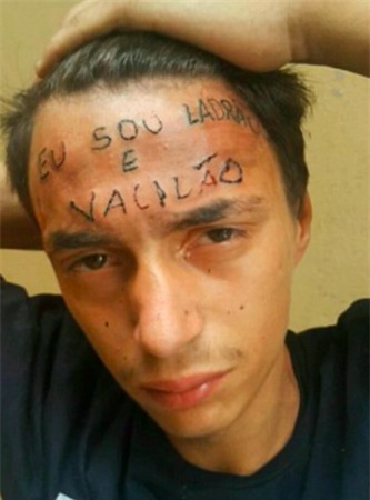 Thanh niên Brazil nổi tiếng vì hình xăm Tôi là kẻ trộm trên trán vừa bị bắt vì tội... ăn trộm - Ảnh 1.