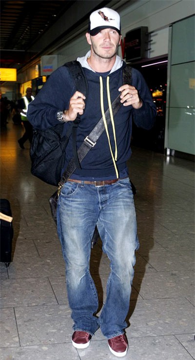 David Beckham arrives to Heathrow airport wearing a trendy hat. August 31, 2009