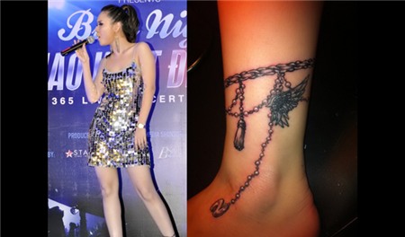 Vũ Hạnh Nguyên ngoài hình xăm chuồn chuồn ở cánh tay và hình xăm sợi xích cùng cánh thiên thần ở cổ chân