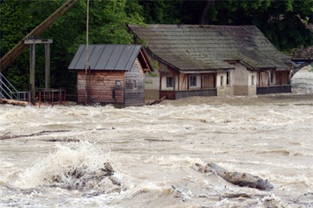 The river Rhine floods buildings near Rheinfelden, southern Germany, Sunday, June 2,2013. Heavy rainfalls cause flooding along rivers and lakes in Germany, Austria, Switzerland and the Czech Republic. (AP