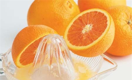Vitamin C trong cam giúp tóc nhanh dài