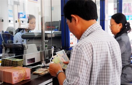 Gửi tiền ở ngân hàng vẫn là kênh an toàn và hiệu quả
trong bối cảnh hiện nay. Ảnh: HTD
