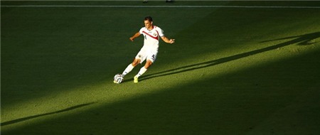 costa-ricas-michael-umana-dribbles-the-ball-in-a-game-against-uruguay