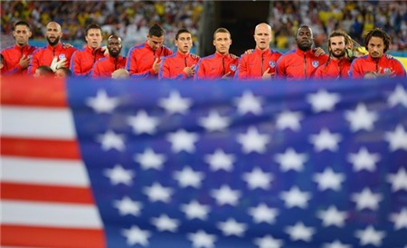 the-usmnt-sings-the-anthem-behind-the-american-flag-before-their-ghana-game.