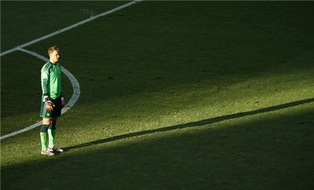 germanys-goalkeeper-manuel-neuer-stands-in-the-spotlight-during-the-germany-ghana-game