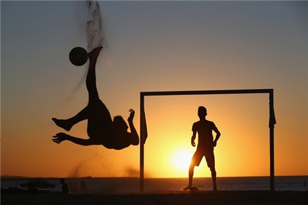 locals-play-soccer-at-sunset-on-a-beach-in-fortaleza-brazil.