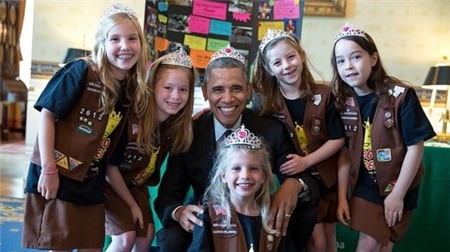 President Obama poses as a princess with Girl Scouts