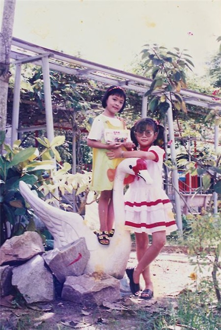 Á hậu Diễm Trang khoe ảnh ngày bé cực dễ thương - 8