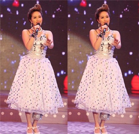 Bảo Thy “mất điểm” vì bộ đồ luộm thuộm. Nó giống như được may từ giấy gói hoa.