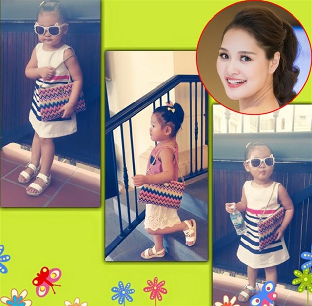 Cách đây không lâu, Hoa hậu Hương Giang đăng bức ảnh công chúa cưng Tiểu Panda mặc váy, đeo kính và túi xách, điệu đà không kém người lớn.