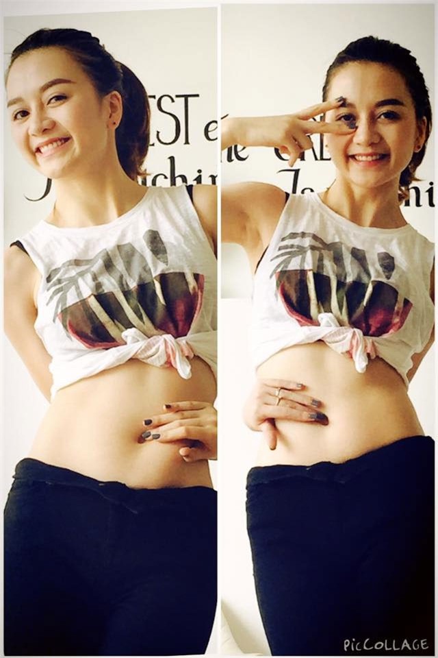 Sao Việt chạm tay vào rốn để chứng minh dáng đẹp