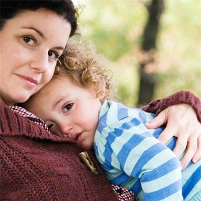 mom hugging toddler