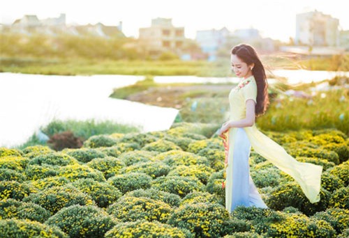 Thúy Vi 'khoác' nhan sắc mới du xuân - 9