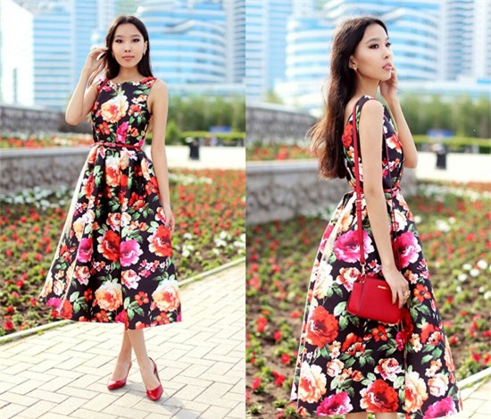 Chiếc váy xòe họa tiết hoa văn, túi và giày màu đỏ khiến tín đồ thời trang 21 tuổi Aibina Yeshkeyeva 21 tuổi từ Kazakhstan thu hút mọi ánh nhìn.