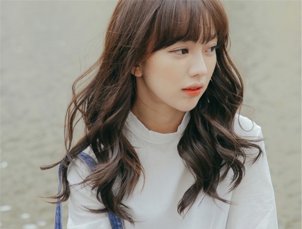 4 kiểu tóc giúp bạn xinh nhất với áo dài dịp Tết này - Ảnh 5.