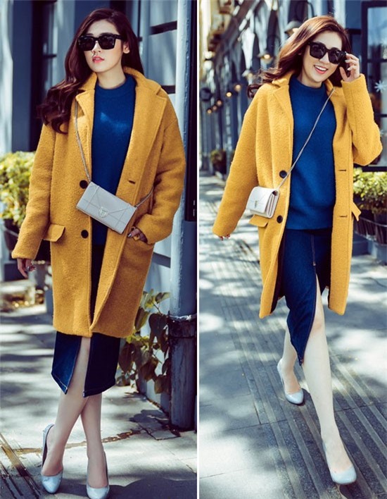 Á hậu Tú Anh diện chân váy denim, áo xanh, áo khoác vàng tạo nên tổng thểtuyệt đẹp trong ngày hẹn hò trời lạnh.
