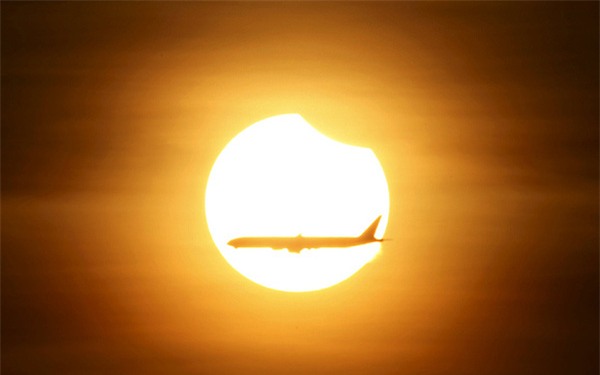 Chùm ảnh: Toàn cảnh nhật thực sáng nay tại Việt Nam và các nước Châu Á - Ảnh 33.