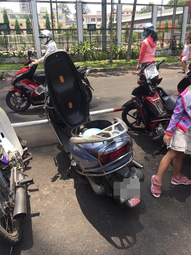Gửi xe ở trung tâm Sài Gòn, bị kẻ gian cạy cốp lấy tài sản - Ảnh 3.