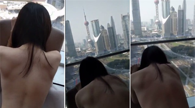 Video sex của cặp đôi quay trong khách sạn có view nhìn ra tòa tháp nổi tiếng Thượng Hải lan truyền chóng mặt - Ảnh 1.