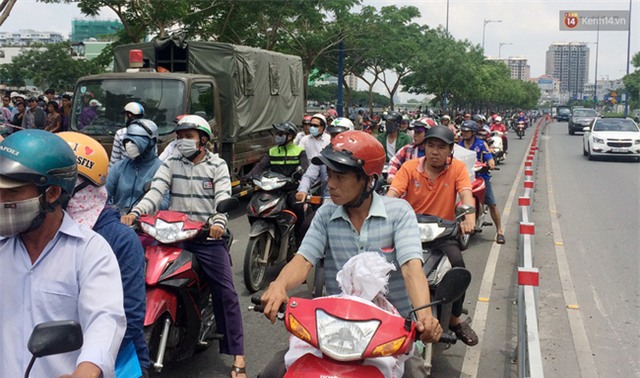 Với tay cứu cháu bị trượt chân, 2 ông cháu chết đuối thương tâm ở Sài Gòn - Ảnh 2.