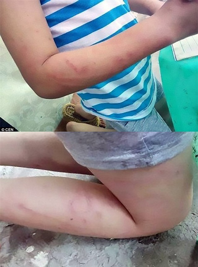 Dat diem kem, con bi me bat quy lam bai tap tren pho hinh anh 1