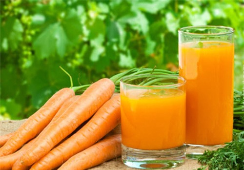 Lạm dụng nước ép cà rốt: Độc hại vô cùng - Ảnh 2.
