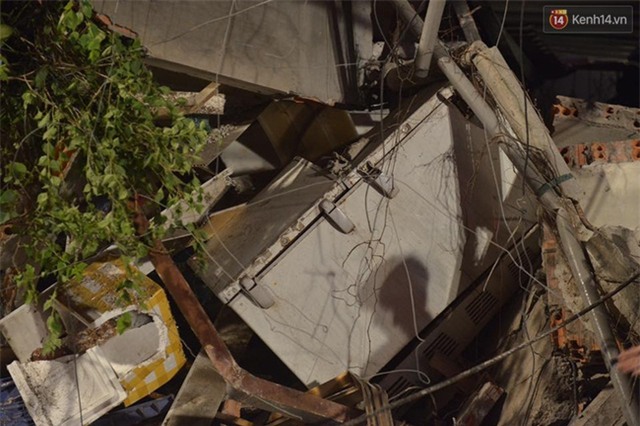 Hà Nội: Sập nhà 4 tầng giữa phố Cửa Bắc, 2 người tử vong - Ảnh 12.