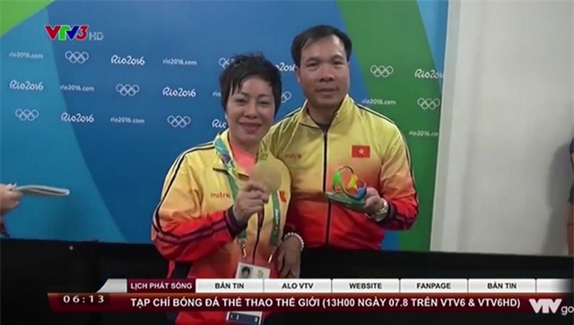 'Người đàn bà thép' sau tấm HCV Olympic: 'Vinh nói tấm huy chương này em dành tặng chị' - 1