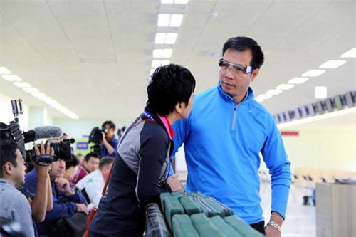 'Người đàn bà thép' sau tấm HCV Olympic: 'Vinh nói tấm huy chương này em dành tặng chị' - 3