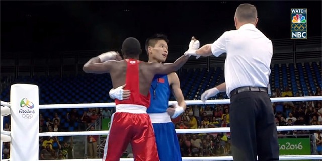 Sớm ăn mừng chiến thắng, tay đấm người Trung Quốc nhận kết cục đắng lòng - Ảnh 7.