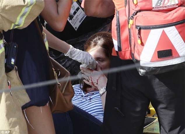 Camera trọng lượng bằng chiếc xe máy rơi ở Công viên Olympic khiến 7 người bị thương - Ảnh 5.