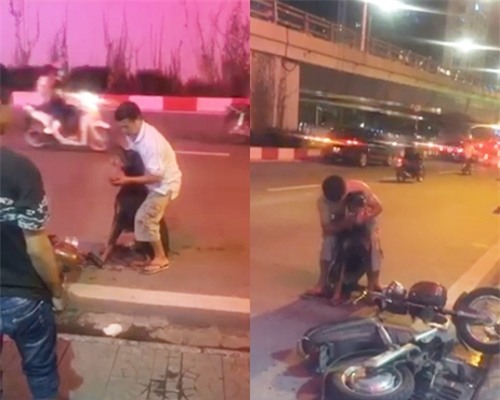 Clip: Người chủ ôm chú chó Doberman bị trọng thương gào thét giữa đường phố Hà Nội - Ảnh 2.