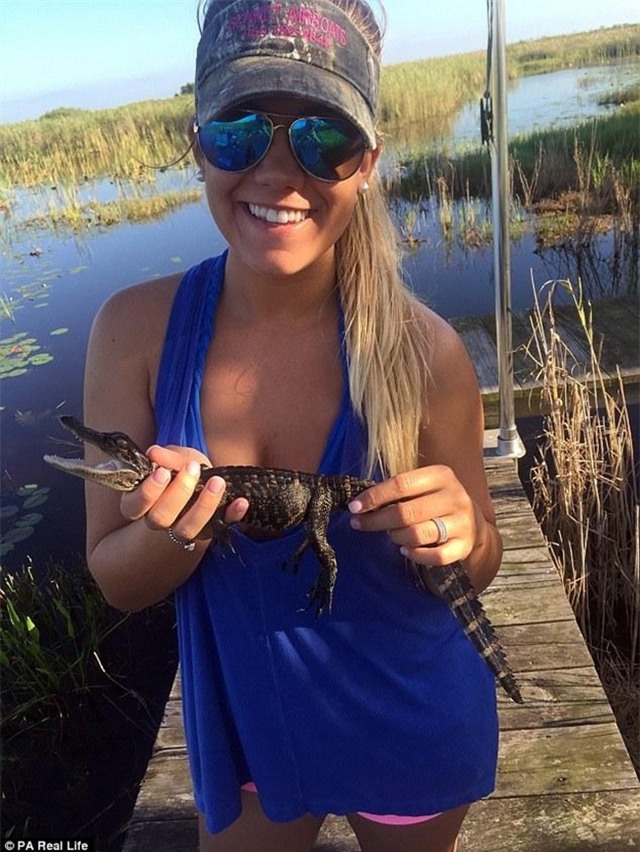 Cô gái xinh đẹp có niềm đam mê mãnh liệt với bộ môn săn bắt cá sấu - Ảnh 12.