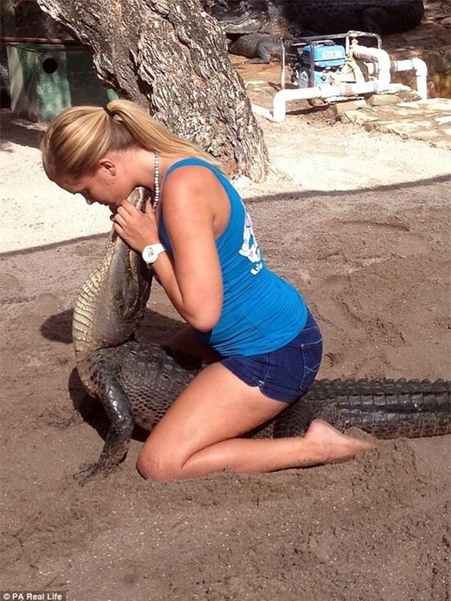 Cô gái xinh đẹp có niềm đam mê mãnh liệt với bộ môn săn bắt cá sấu - Ảnh 8.