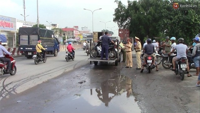 Bình Dương: Tránh vũng nước, cô gái trẻ bị xe container cán chết thảm - Ảnh 1.