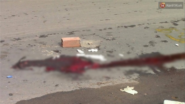 Bình Dương: Tránh vũng nước, cô gái trẻ bị xe container cán chết thảm - Ảnh 2.