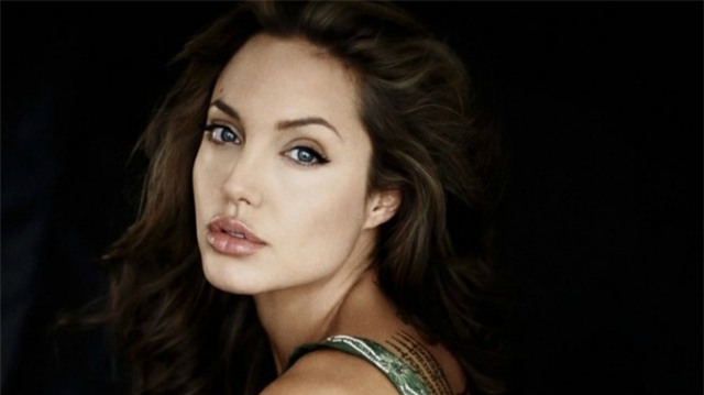 Angelina Jolie và Brad Pitt: Bỗng một ngày ta... chán nhau - Ảnh 4.