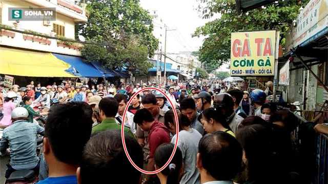Cô gái dùng mũ bảo hiểm đánh tới tấp tên cướp giữa phố Sài Gòn - Ảnh 1.