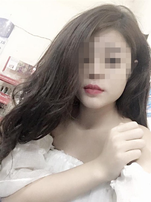 N.L - cô gái mặc váy xanh trong clip thách rượu