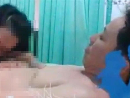 Hình ảnh ông V. và người tình được cắt ra từ clip.