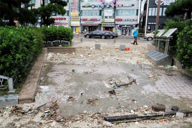 Cảnh tượng ngập lụt, đổ nát kinh hoàng sau bão tại siêu đô thị Hàn Quốc - Ảnh 27.