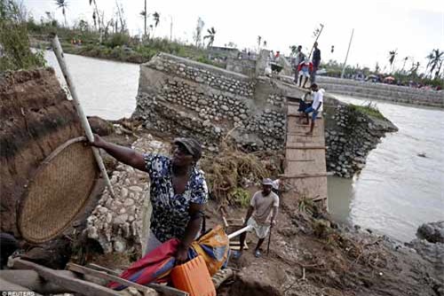 Cảnh hoang tàn và chết chóc ở Haiti sau cơn bão lịch sử Matthew - 12