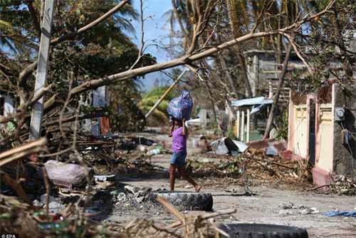 Cảnh hoang tàn và chết chóc ở Haiti sau cơn bão lịch sử Matthew - 14