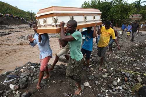 Cảnh hoang tàn và chết chóc ở Haiti sau cơn bão lịch sử Matthew - 16