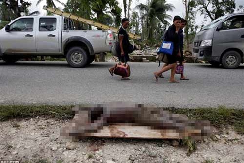 Cảnh hoang tàn và chết chóc ở Haiti sau cơn bão lịch sử Matthew - 17
