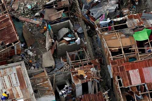 Cảnh hoang tàn và chết chóc ở Haiti sau cơn bão lịch sử Matthew - 8