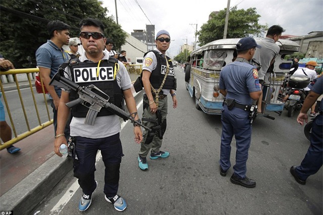 Chùm ảnh: Hơn 3.700 người đã chết trong cuộc chiến chống tội phạm ma túy ở Philippines - Ảnh 1.