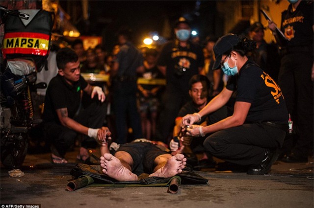 Chùm ảnh: Hơn 3.700 người đã chết trong cuộc chiến chống tội phạm ma túy ở Philippines - Ảnh 6.