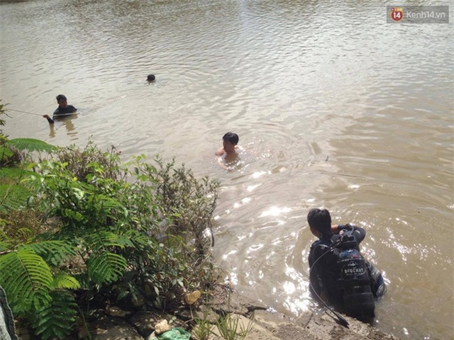Vụ mẹ ôm 2 con nhảy sông ở Sài Gòn: Đã tìm thấy thi thể người mẹ - Ảnh 1.